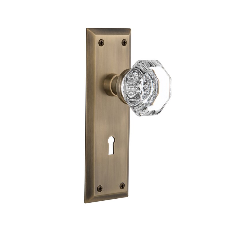Nostalgic Warehouse Clear Crystal Waldorf Passage Door Knob with Keyhole New York Long Plate